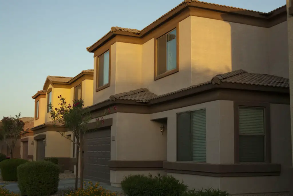 Arizona adobe style townhouse fronts- Light brown with darker brown roof