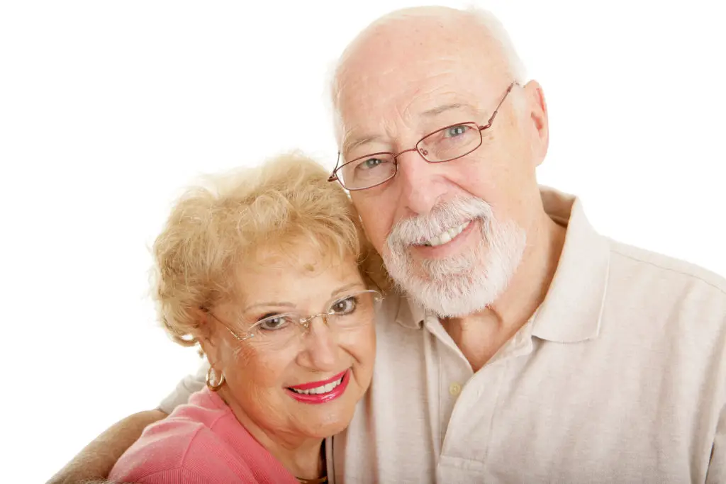 A man and woman wearing glasses.