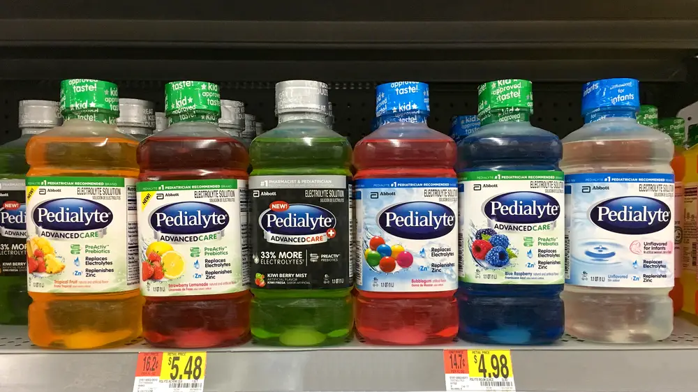 A selection of different pedialyte drinks in a pharmacy nice